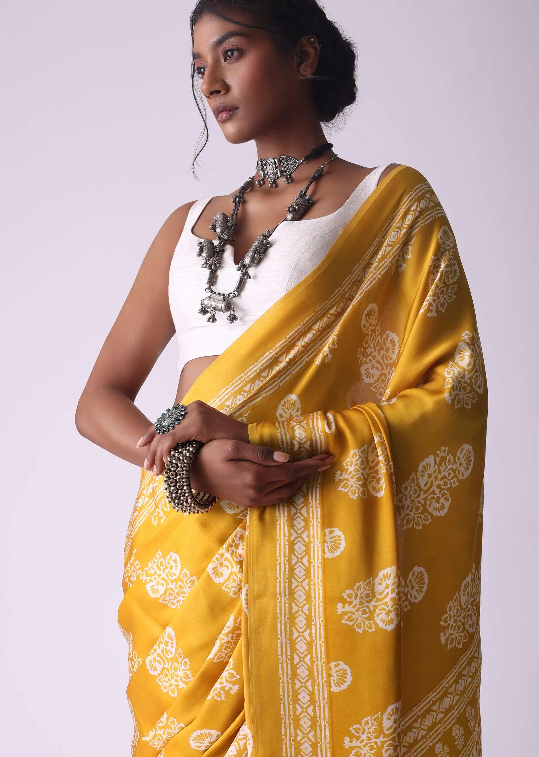Amber Yellow Batic Printed Crepe Saree